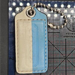 Coach Blue and Cream Leather Hangtag
